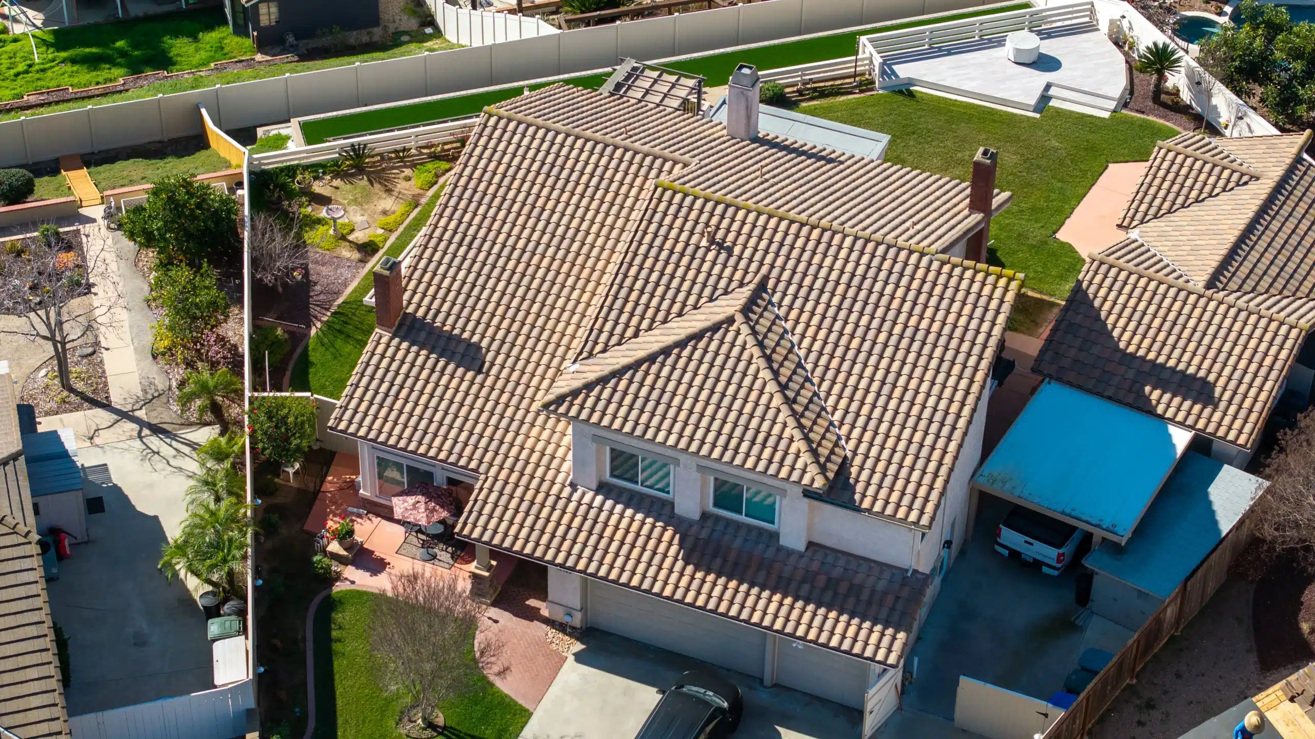 Completed roof replacement on a San Diego home with new Spanish tile