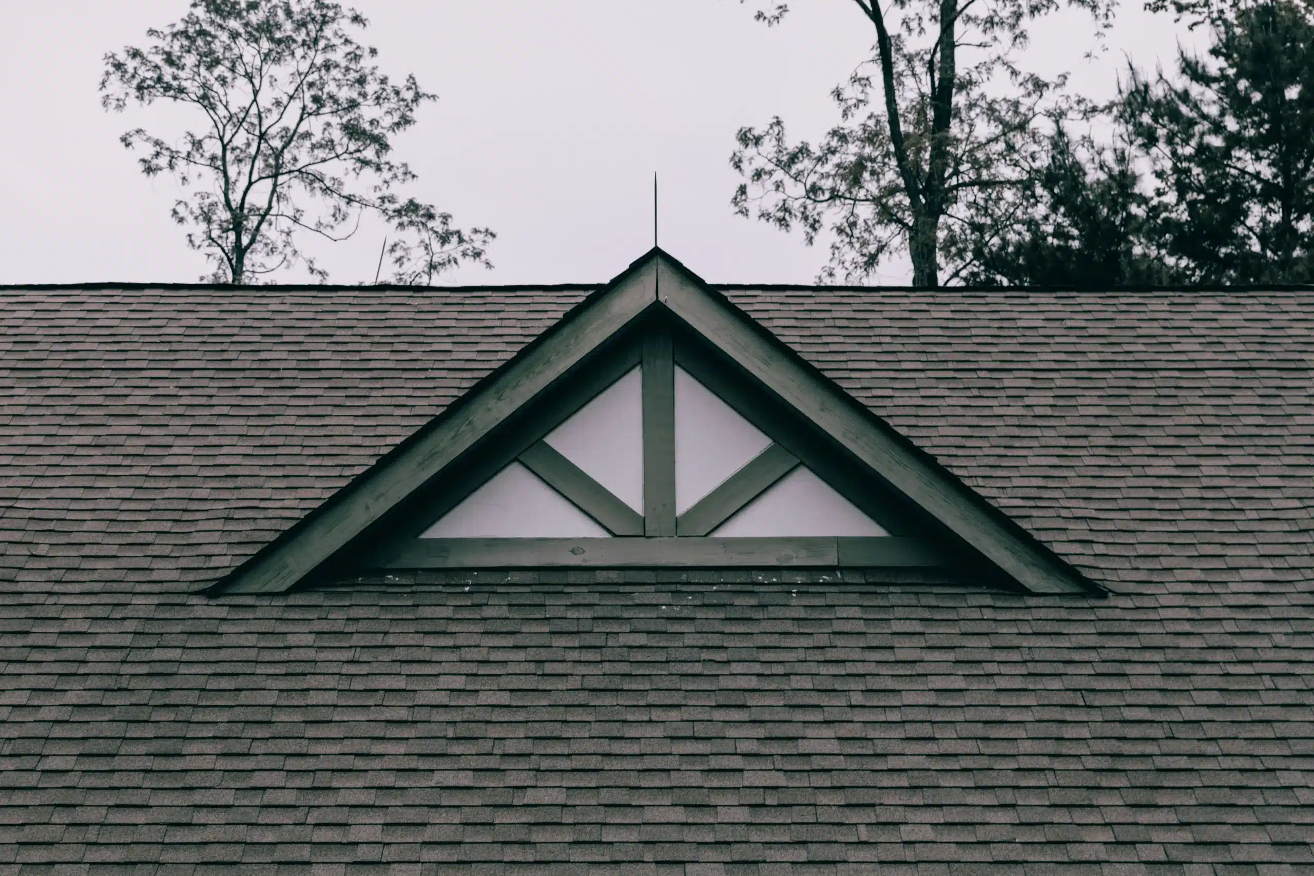 Asphalt shingle roof replacement showing detailed gable work