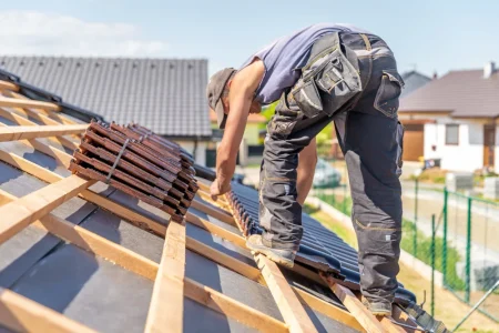 Tile roof installation in progress on a residential San Diego home